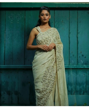 Off white linen saree with pearl highlights